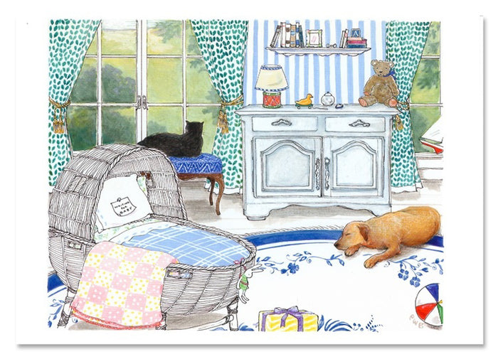 A cozy room with green curtains, a wicker bassinet, a black cat on a bench, and a brown dog on a blue rug; beside the colorful ball and gift is CIAO BELLA's WAITING FOR BABY CARD, an envelope with a blank note card peeking out.