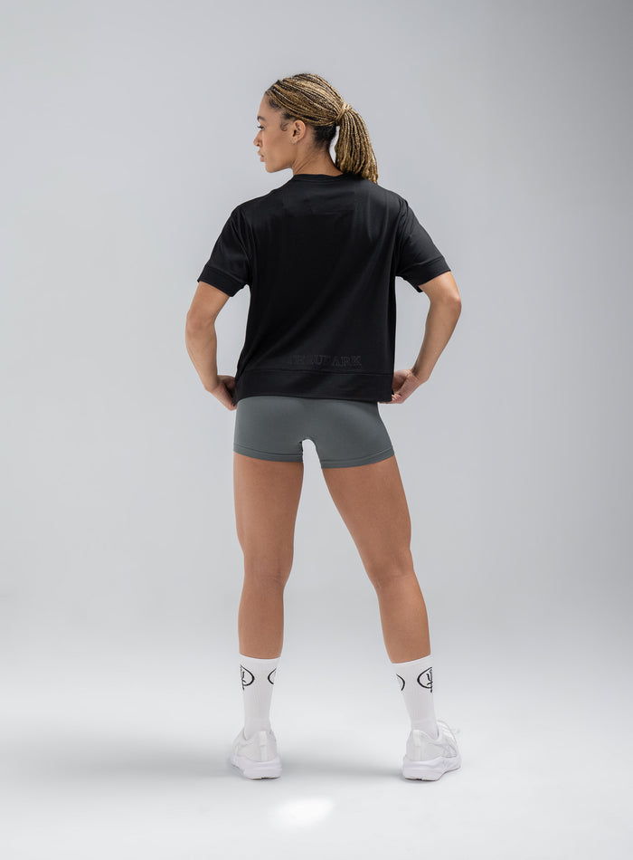 Jade Is 5ft 8" And Wears Size: S | Hem Studio Image Of Model Wearing Force Boxy Drirelease® T-Shirt In Obsidian Black (SS Model)