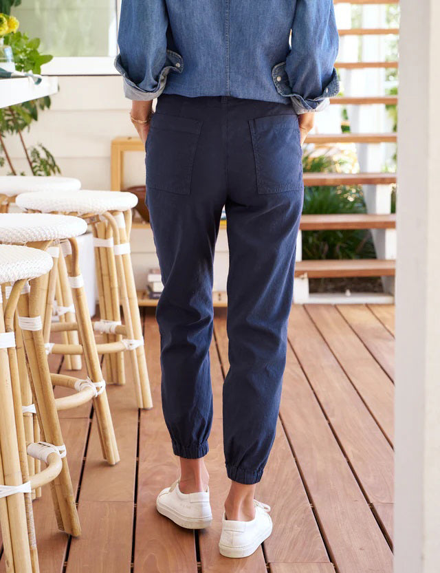 FRANK & EILEEN Jameson Utility Jogger in Performance Linen Navy, featuring a high-rise fit, elastic waistband and cuffs, utility pockets, belt loops, and visible stitching details, shown laid flat on a white background.