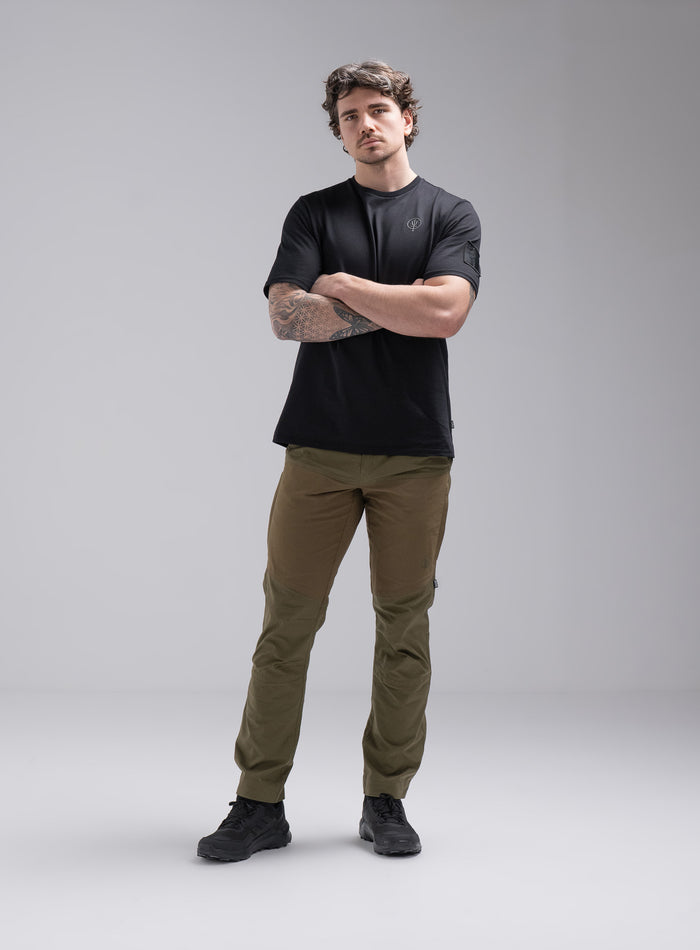 Jack Is 6ft 3" And Wears Size: L | Hem Studio Image Of Model Wearing Insignia Short Sleeve T-Shirt In Obsidian Black (SS Model)