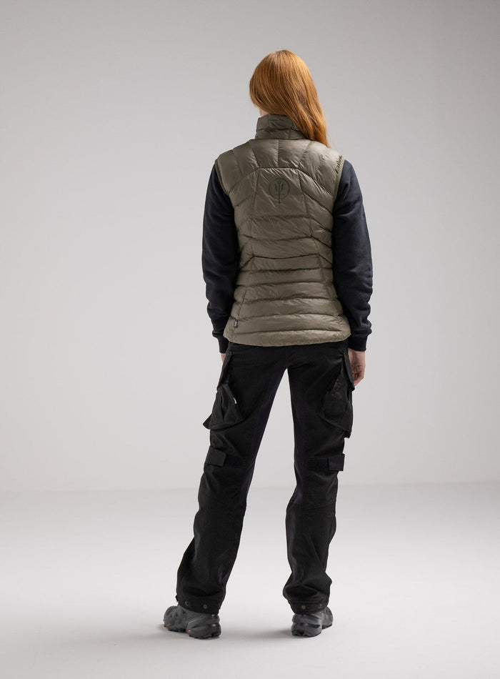 Miki Is 5ft 8" And Wears Size: S | Hem Studio Image Of Model Wearing Ithax Gilet Womens In Olive Green (SS Model)