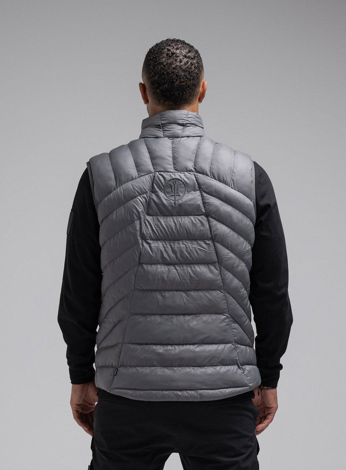 Dj Is 6ft 4" And Wears Size: Xl | Hem Studio Image Of Model Wearing Ithax Gilet In Wolf Grey (SS Model)