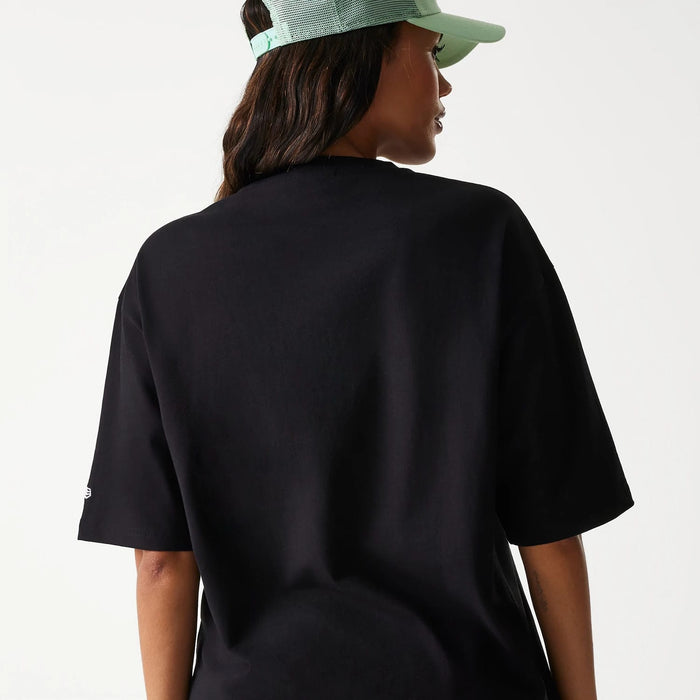 The Male model is wearing New Era Outdoor Graphic Black Oversized T-Shirt 8