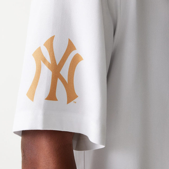 The Male model is wearing New York Yankees MLB Graphic White Revere Short Sleeve Shirt 8