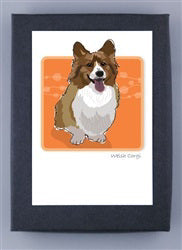 PAPER RUSSELLS - CORGI BOXED CARDS by PAPER RUSSELLS feature a fluffy brown and white corgi with pointy ears and tongue out, on an orange bubble background, in a black frame. Printed on FSC certified recycled paper, made in the USA.
