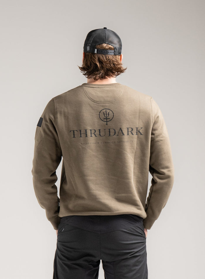 Rudie Is 6ft 2" And Wears Size: M | Hem Studio Image Of Model Wearing Vader Jumper - Originals In Khaki (SS Model)