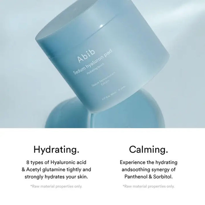 A light blue cylindrical container labeled "SEDUM HYALURON PAD HYDRATING TOUCH" by ASIAN BEAUTY WHOLESALE, featuring Sedum Sarmentosum Extract, hyaluronic acid, and containing 60 hydrating toning pads.