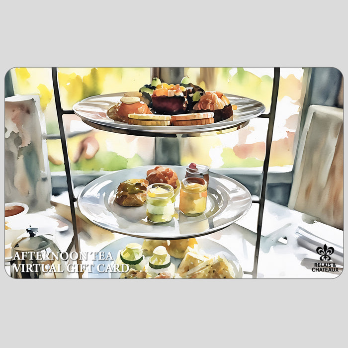 A person holds a tray of pastries, berry tarts, and whipped cream. Text reads “AFTERNOON TEA FOR TWO GIFT CARD” from FEARRINGTON VILLAGE and shows the Relais & Châteaux logo.