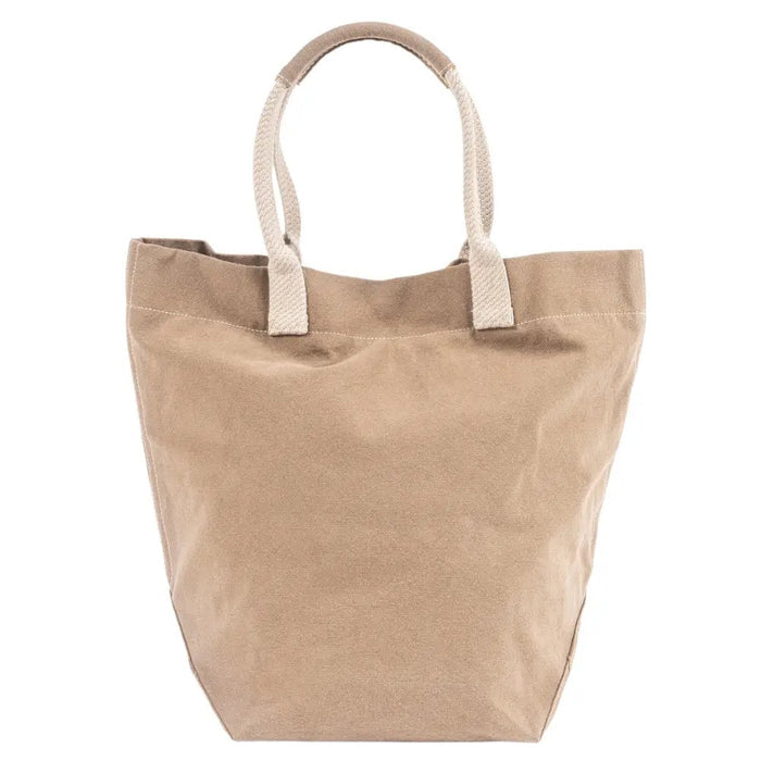 The TRAVAUX EN COURS CANVAS TOTE BAG is a versatile teal accessory with beige 100% cotton canvas handles. It features a spacious main compartment, with securely stitched handles ideal for carrying by hand or over the shoulder.