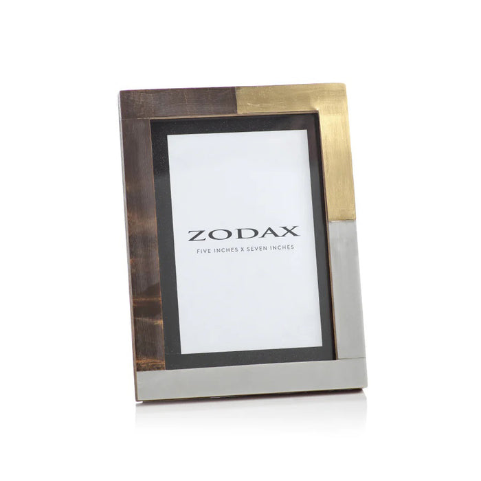 The ZODAX CAPE TOWN PHOTO FRAME 5X7 is a rectangular polyresin frame with gold, silver, and bronze metallic segments, featuring a photo placeholder on a white background.