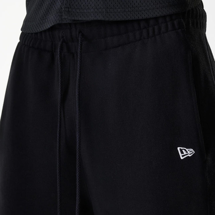The Male model is wearing Chicago Bulls NBA Arch Graphic Black Joggers 6