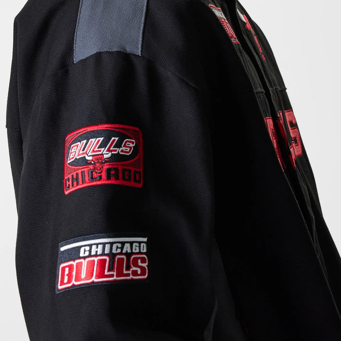 The Male model is wearing Chicago Bulls NBA Motorsport Black Motorsports Jacket 4