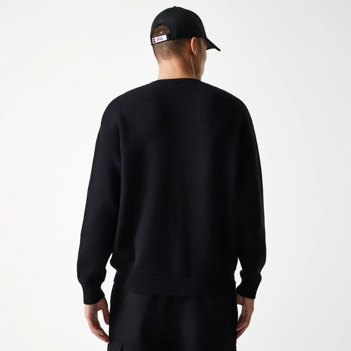 The Male model is wearing Chicago Bulls NBA Knit Black Oversized Knit Sweater 2