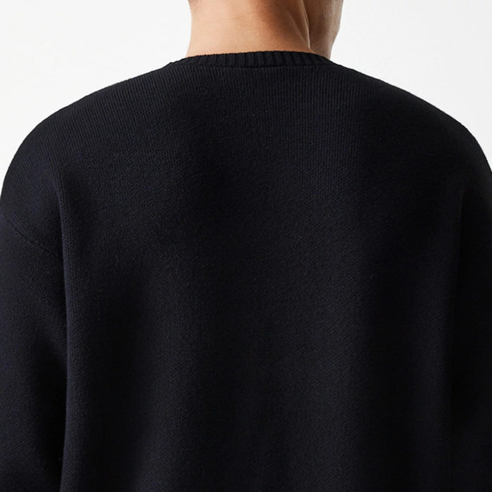 The Male model is wearing Chicago Bulls NBA Knit Black Oversized Knit Sweater 8