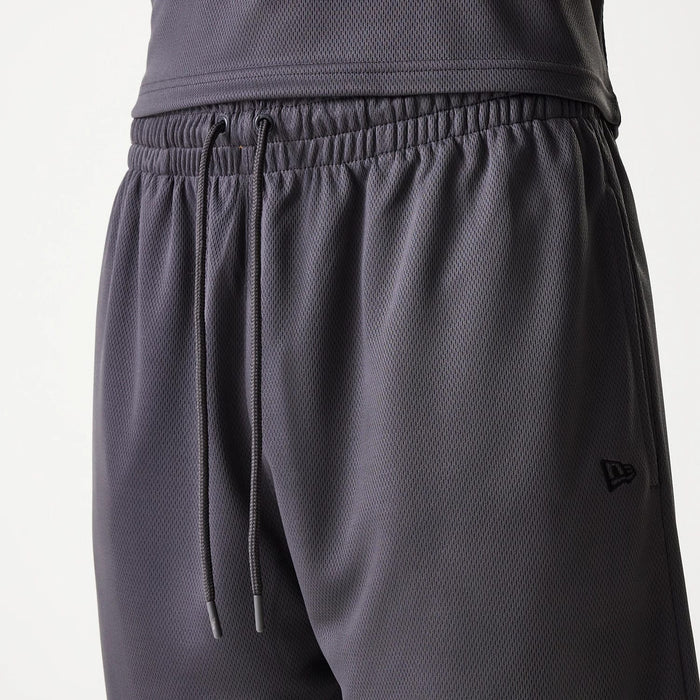 The Male model is wearing Chicago Bulls NBA Tonal Dark Grey Mesh Shorts 6