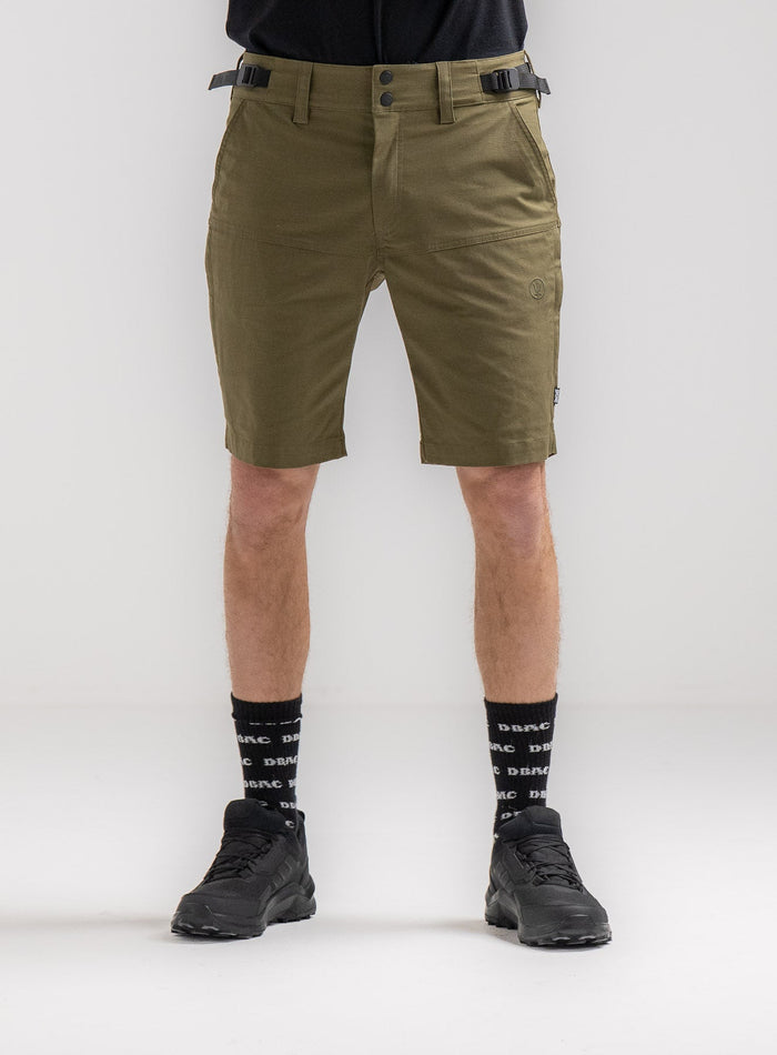 Rudie Is 6ft 2" And Wears Size: M | Hem Studio Image Of Model Wearing Command Shorts In Khaki (SS Model)