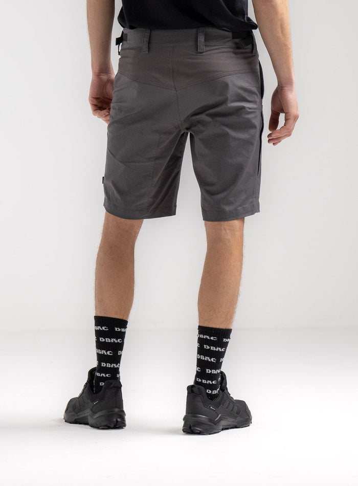 Rudie Is 6ft 2" And Wears Size: M | Hem Studio Image Of Model Wearing Command Shorts In Grey (SS Model)