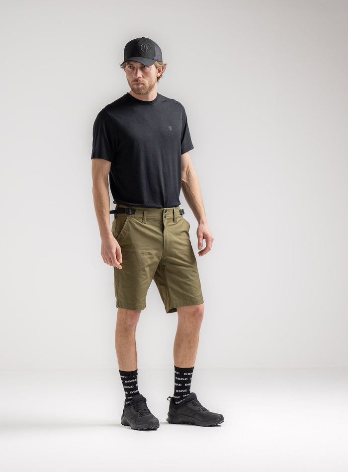 Rudie Is 6ft 2" And Wears Size: M | Hem Studio Image Of Model Wearing Command Shorts In Khaki (SS Model)