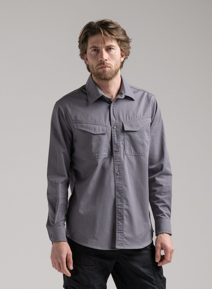 Rudie Is 6ft 2" And Wears Size: M | Hem Studio Image Of Model Wearing Covert Shirt In Raven Grey (SS Model)