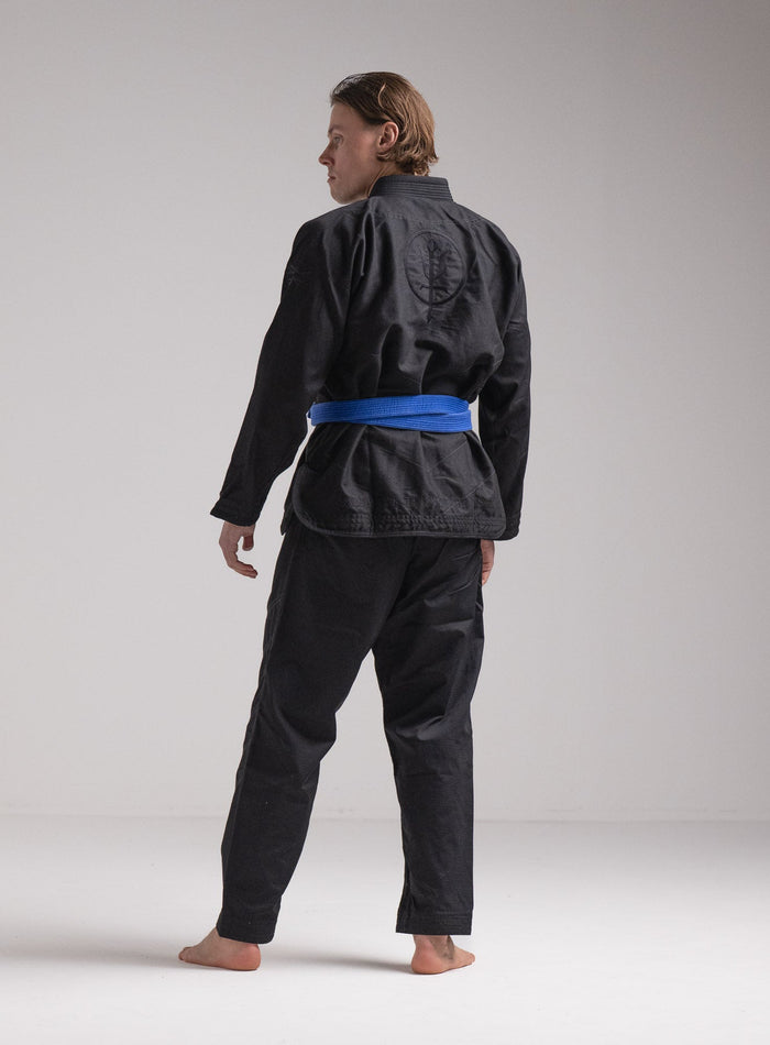 Angus Is 6ft 4" | Hem Studio Image Of Model Wearing Dbac Gi In Obsidian Black (SS Model)