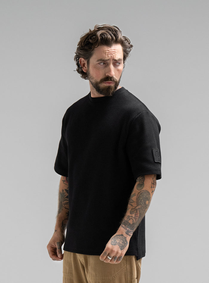 Studio Image Of Dissident Waffle Short Sleeve T-Shirt In Obsidian Black (SS Model)