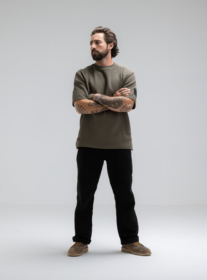 Max Is 5ft 8" And Wears Size: M | Hem Studio Image Of Model Wearing Dissident Waffle Short Sleeve T-Shirt In Khaki (SS Model)
