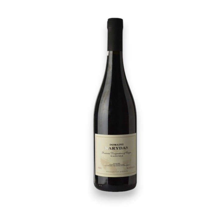 A dark glass wine bottle with a cream label reading "DOMAINE KARYDAS XINOMAVRO 2021," from WINE: KELLOGG SELECTIONS, sits against a white background—a refined Greek red for Naoussa wine lovers.
