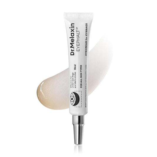 A white tube labeled "DR MELAXIN - EYEPHALT EYEBAG CREAM" from KOSMIC KBEAUTY SKINCARE, with a silver applicator tip, is displayed in front of a smear of cream on a white background.