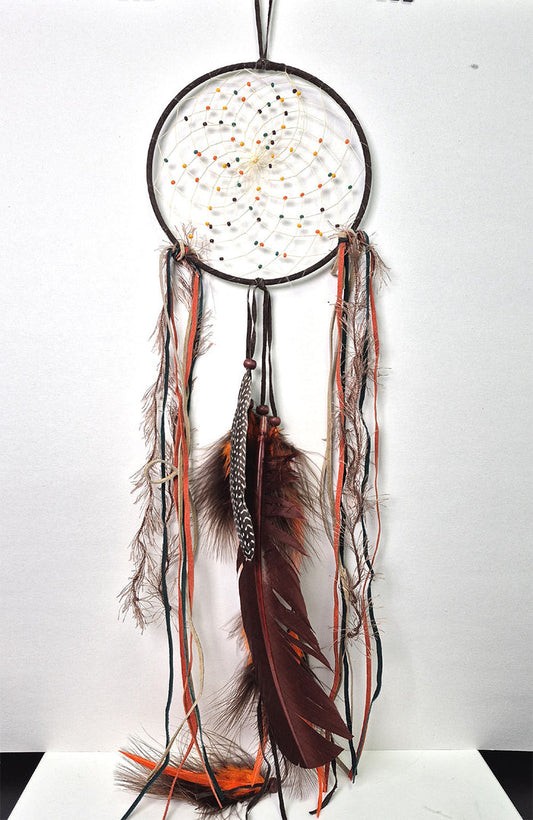 6" dark brown Fall Dream Catcher embellished with orange, green and black beads, leathers and feathers. Handmade in Canada.