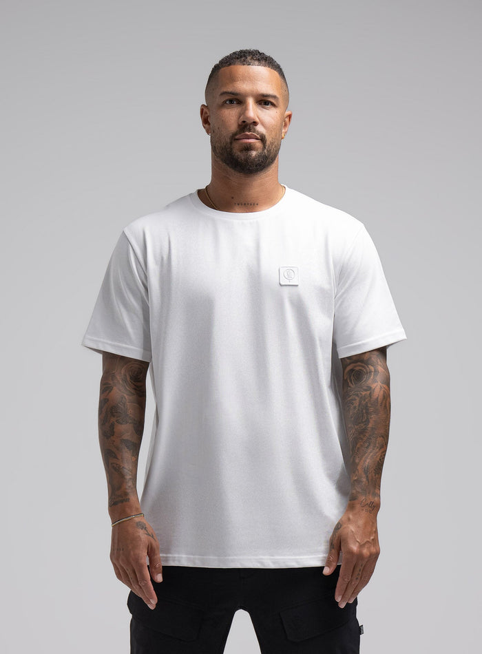 Dj Is 6ft 4" And Wears Size: Xl | Hem Studio Image Of Model Wearing Enigma Oversized Tee In White (SS Model)