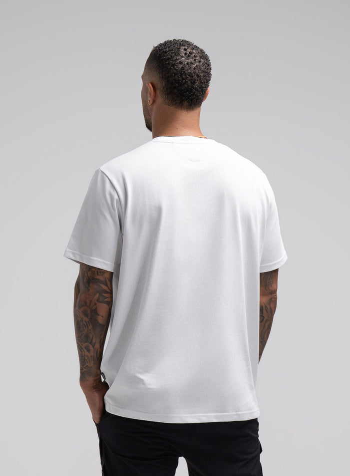 Dj Is 6ft 4" And Wears Size: Xl | Hem Studio Image Of Model Wearing Enigma Oversized Tee In White (SS Model)