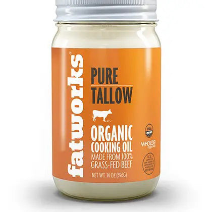 A jar of FATWORKS - GRASSFED BEEF TALLOW cooking oil is shown with a white lid and an orange label featuring a white cow graphic. The label indicates it is made from 100% grass-fed beef and includes a Whole30 Approved symbol. The jar contains 14 oz (396g).