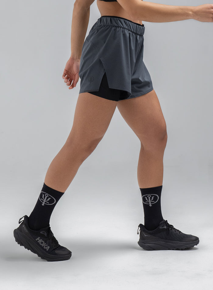 Jade Is 5ft 8" And Wears Size: S | Hem Studio Image Of Model Wearing Force 2-In-1 Shorts Womens In Storm Blue (SS Model)