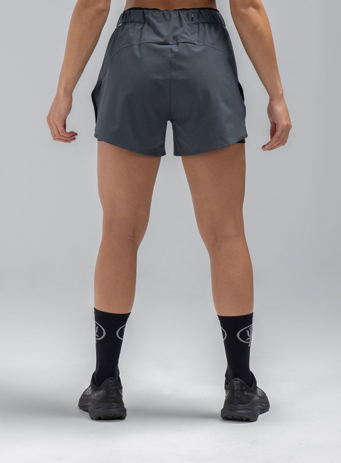 Jade Is 5ft 8" And Wears Size: S | Hem Studio Image Of Model Wearing Force 2-In-1 Shorts Womens In Storm Blue (SS Model)