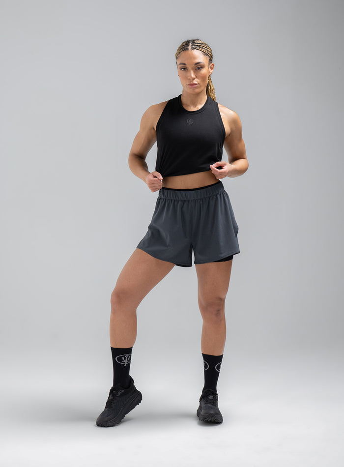 Jade Is 5ft 8" And Wears Size: S | Hem Studio Image Of Model Wearing Force 2-In-1 Shorts Womens In Storm Blue (SS Model)