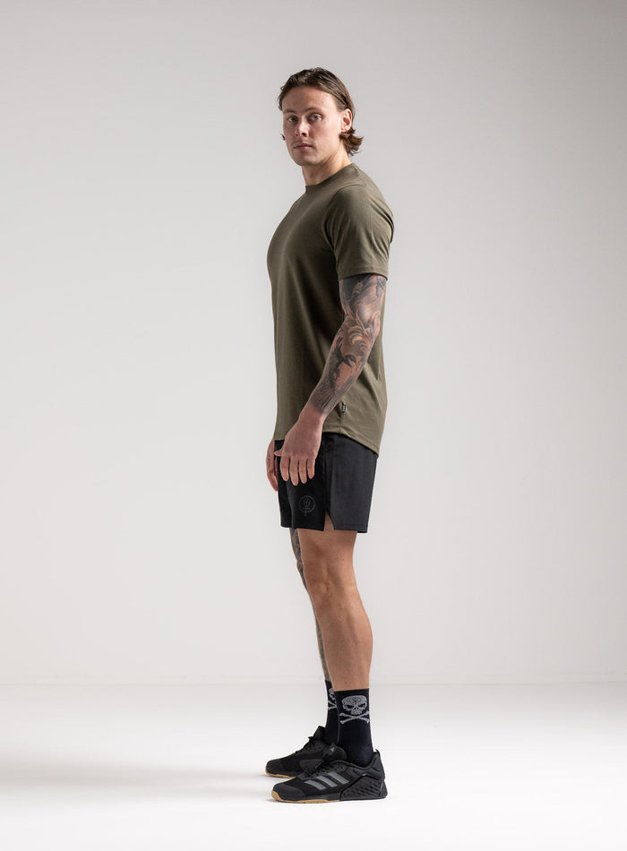 Angus Is 6ft 4" And Wears Size: L | Hem Studio Image Of Model Wearing Force Active Drirelease® Tshirt In Khaki (SS Model)