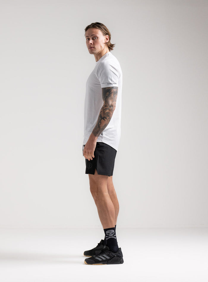 Angus Is 6ft 4" And Wears Size: L | Hem Studio Image Of Model Wearing Force Active Drirelease® Tshirt In Optic White (SS Model)