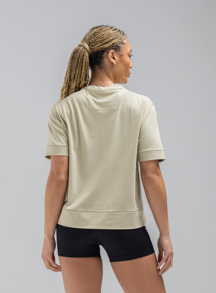 Jade Is 5ft 8" And Wears Size: S | Hem Studio Image Of Model Wearing Force Boxy Drirelease® T-Shirt In Stone (SS Model)