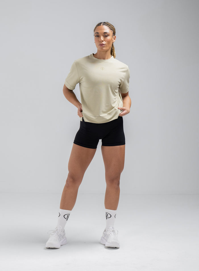 Jade Is 5ft 8" And Wears Size: S | Hem Studio Image Of Model Wearing Force Boxy Drirelease® T-Shirt In Stone (SS Model)