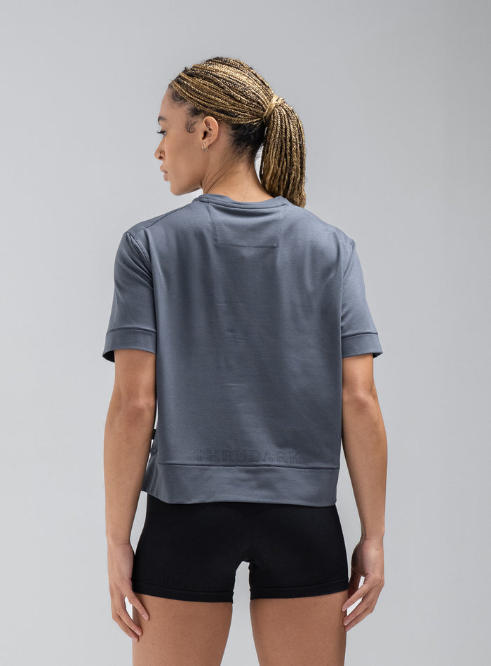 Jade Is 5ft 8" And Wears Size: S | Hem Studio Image Of Model Wearing Force Boxy Drirelease® T-Shirt In Storm Blue (SS Model)