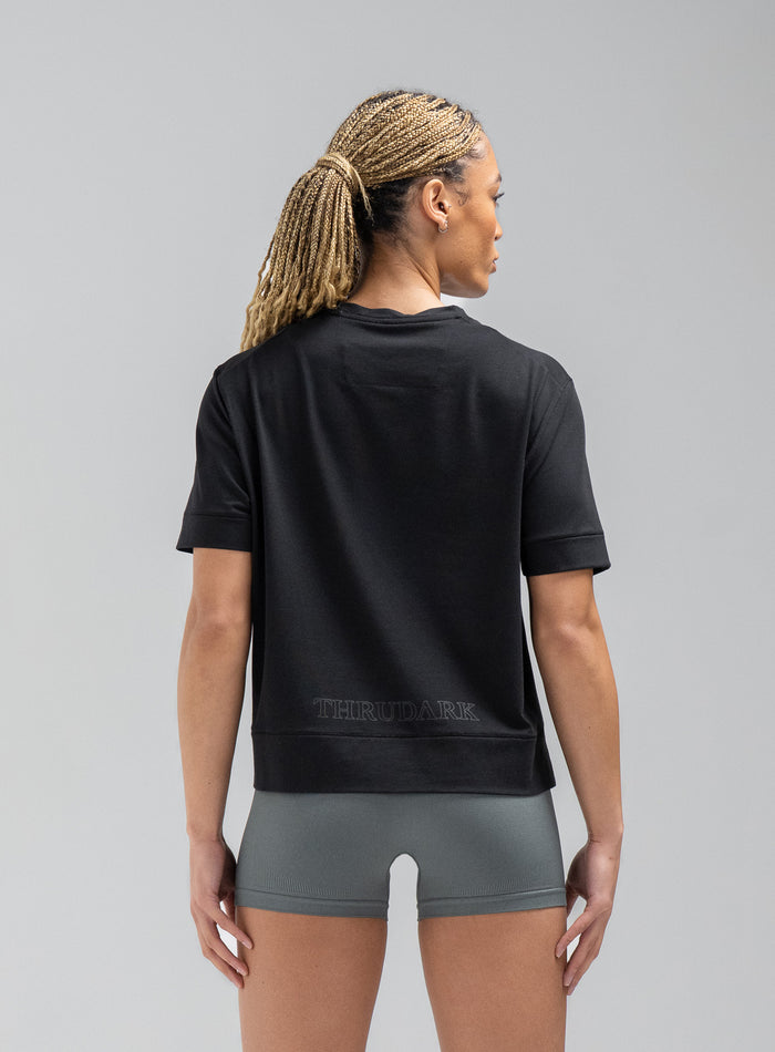 Jade Is 5ft 8" And Wears Size: S | Hem Studio Image Of Model Wearing Force Boxy Drirelease® T-Shirt In Obsidian Black (SS Model)
