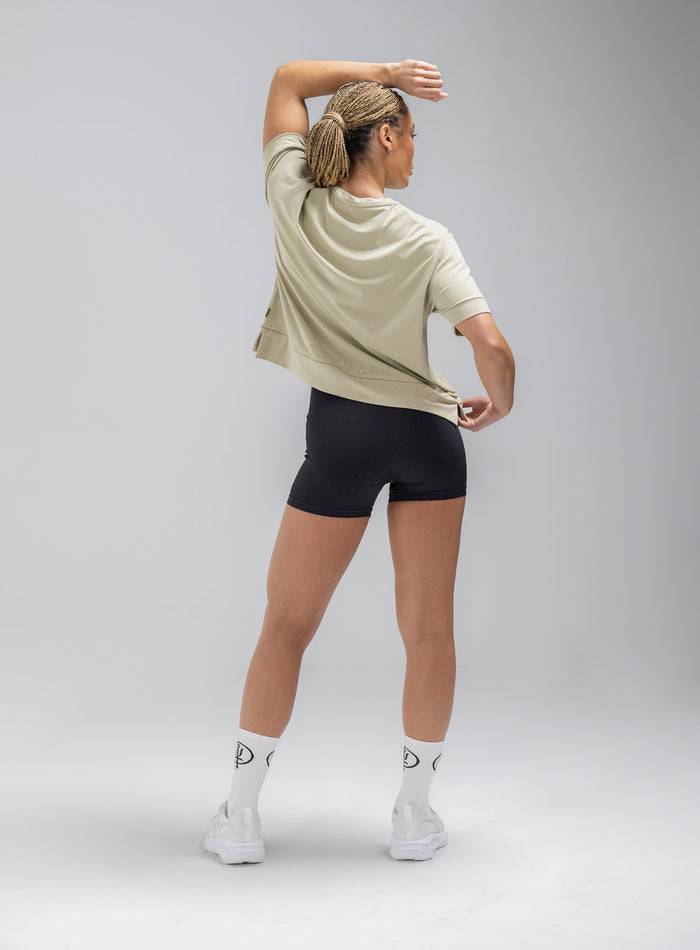 Jade Is 5ft 8" And Wears Size: S | Hem Studio Image Of Model Wearing Force Boxy Drirelease® T-Shirt In Stone (SS Model)