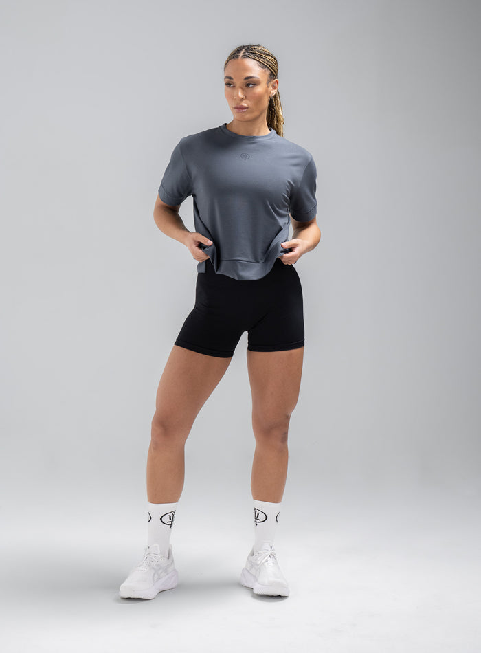 Jade Is 5ft 8" And Wears Size: S | Hem Studio Image Of Model Wearing Force Boxy Drirelease® T-Shirt In Storm Blue (SS Model)