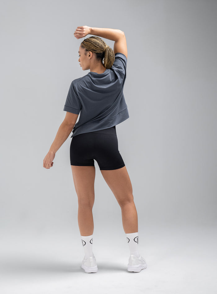 Jade Is 5ft 8" And Wears Size: S | Hem Studio Image Of Model Wearing Force Boxy Drirelease® T-Shirt In Storm Blue (SS Model)