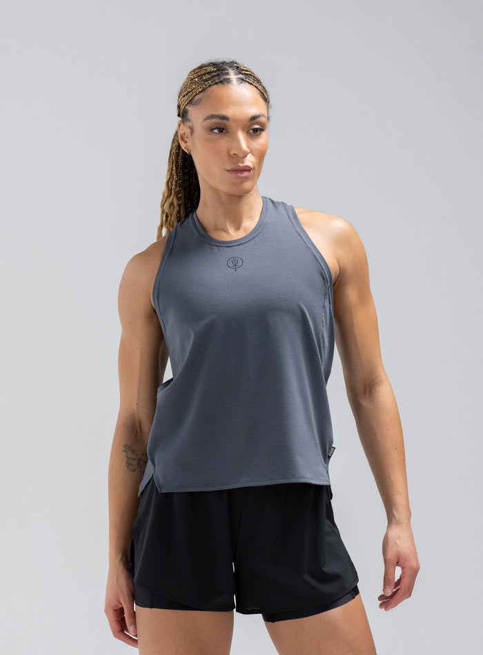 Jade Is 5ft 8" And Wears Size: S | Hem Studio Image Of Model Wearing Force Drirelease® Tank Vest In Storm Blue (SS Model)