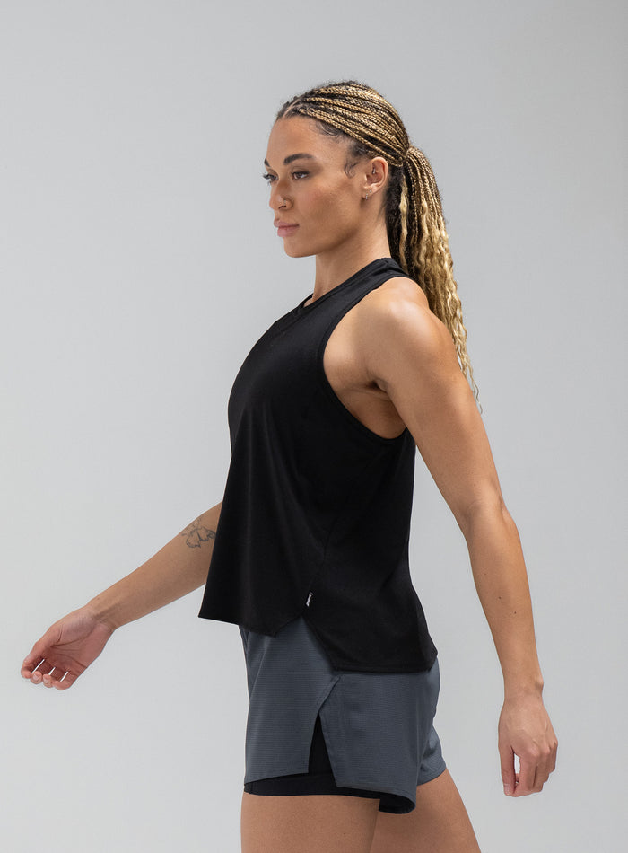Jade Is 5ft 8" And Wears Size: S | Hem Studio Image Of Model Wearing Force Drirelease® Tank Vest In Obsidian Black (SS Model)