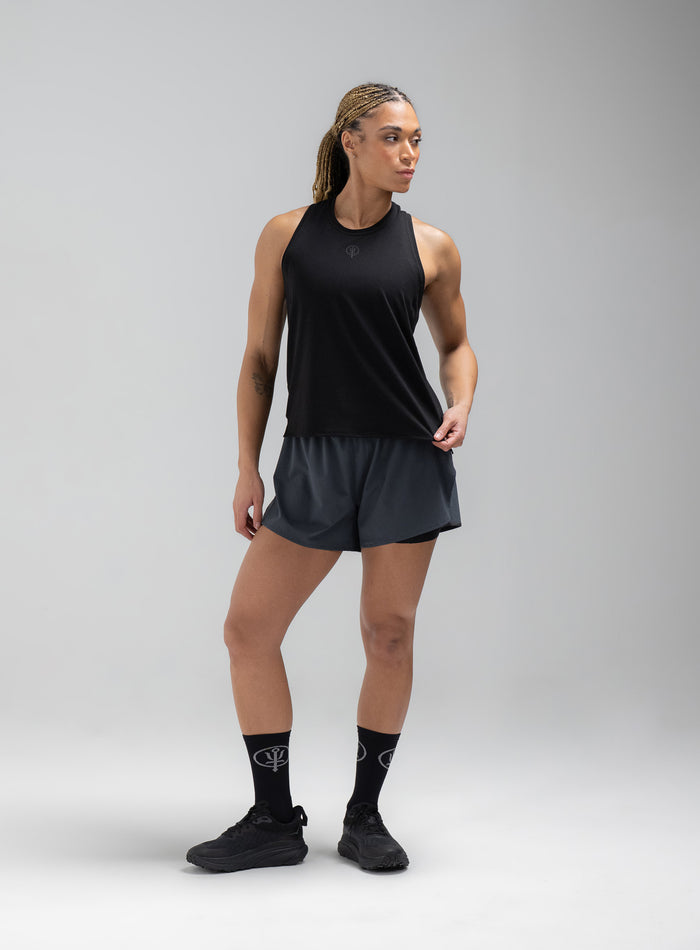 Jade Is 5ft 8" And Wears Size: S | Hem Studio Image Of Model Wearing Force Drirelease® Tank Vest In Obsidian Black (SS Model)