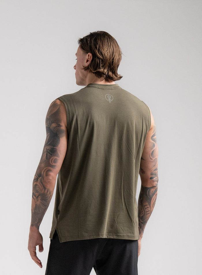 Angus Is 6ft 4" And Wears Size: L | Hem Studio Image Of Model Wearing Force Drirelease® Tank In Khaki (SS Model)