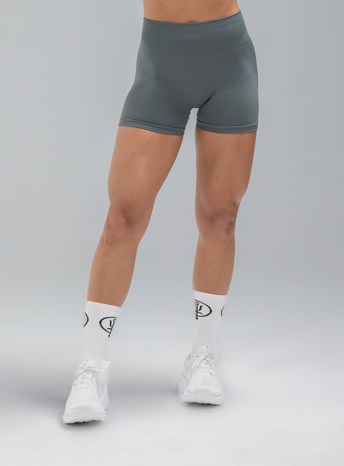 Jade Is Wearing Seamless And Is 5ft 8" And Wears Size: S/M | Hem Studio Image Of Model Wearing Force Seamless Shorts In Urban Green (SS Model)