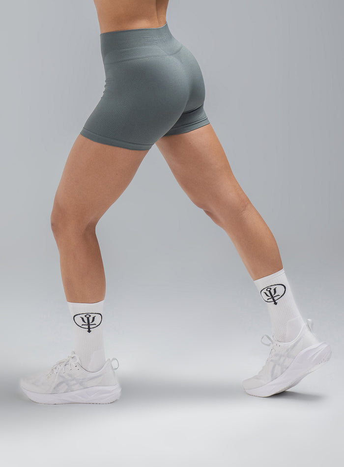 Jade Is Wearing Seamless And Is 5ft 8" And Wears Size: S/M | Hem Studio Image Of Model Wearing Force Seamless Shorts In Urban Green (SS Model)